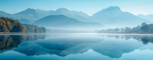 ai genererad fredlig morgon- se av en lugna sjö reflekterande de omgivande bergen och träd under en klar blå himmel. foto