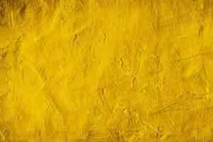 bakgrund textur av gul betong vägg foto