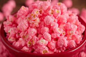 ai genererad röd skål med rosa popcorn foto