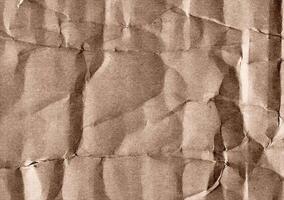 skrynkliga brun kraft papper textur baner bakgrund foto