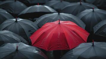 ai genererad en röd paraply bland de svart paraplyer. kontrast begrepp. foto