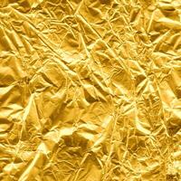 krinklad guld papper textur foto