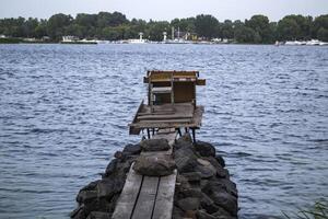 årgång fiskare plats på de flod. foto