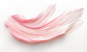 ai genererad en ensam borsta stroke skapande en kamomill kronblad. pastell rosa måla stroke på vit bakgrund foto