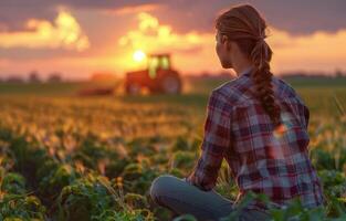 ai genererad kvinna Sammanträde i fält med traktor i bakgrund foto