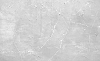 grå betong vägg, gammal vägg bakgrund för tapet eller grafisk design. vit plåster textur i årgång stil foto