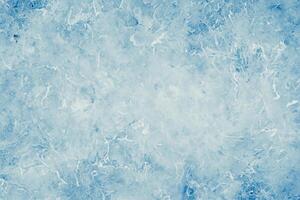 texturerad blå is bakgrund med frysta krångligheter foto