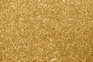 förgyllda drömmar, eterisk bokeh lampor med gnistrande guld glitter. foto