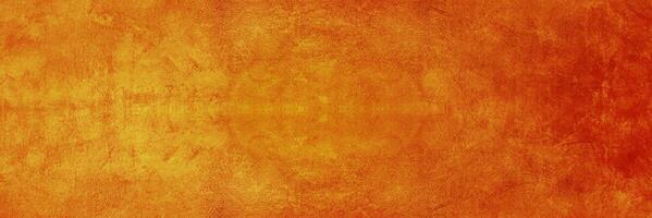texturerad elegans, glänsande cement bakgrund med djup orange nyans. foto
