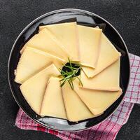 raclette ost gott äter utsökt traditionell måltid matlagning aptitretare måltid mat mellanmål foto