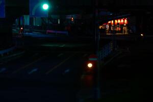 en natt miniatyr- trafik sylt i tokyo foto