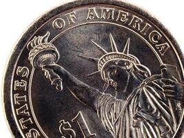 närbild detalj av oss ett dollar guld mynt svans foto