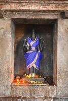 vishnu bild i hindu tempel, Indien foto