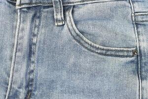 modern denim jeans för tonåringar textur bakgrund foto