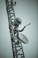 telecom arbetare cliping karbinhake sele för säkerhet foto