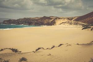 en se av playa de las conchas, en skön strand på la graciosa, en små ö nära lanzarote, kanariefågel öar, i de mitten av de atlanten hav. foto