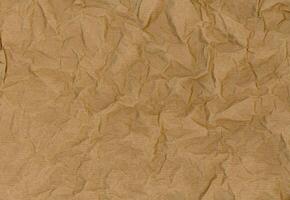 brun skrynkliga papper textur bakgrund foto