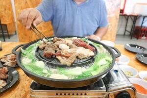 grillad fläsk i de ugn, thai mat och koreanska mat foto