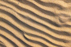 sandstrand av lugn fattande de skönhet av naturlig motiv sandstrand, en lugn gobeläng av jordens mönster foto