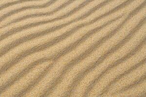 sandstrand av lugn fattande de skönhet av naturlig motiv sandstrand, en lugn gobeläng av jordens mönster foto