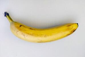 mogen bananer. exotisk tropisk gul frukt. banan symbol av hälsa vård och välbefinnande. foto