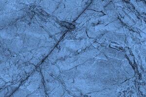 textur av blå marmor plattor med repor. abstrakt bakgrund. foto
