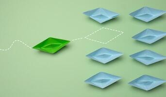 grupp av blå papper båtar rubrik i ett riktning och ett grön ett rubrik i de motsatt riktning. foto