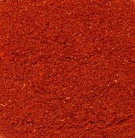 textur av rökt jord röd paprika, full ram foto