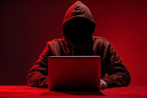 anonym hacker skriver dator bärbar dator. Cyber brott, Cyber attack, mörk webb begrepp. foto