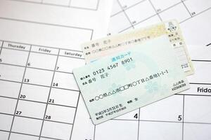 japansk min siffra kort prov och underrättelse kort på kalender bakgrund foto