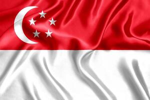 flagga av singapore silke närbild foto