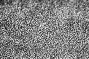 svartvit textur av skinande grained metall. abstrakt bakgrund. foto