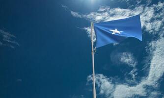 somalia flagga symbol Vinka blå himmel moln vit bakgrund kopia Plats oberoende dag 1 först st juli månad somalisk regering resa emblem horn av afrika frihet regering klok emblem nationell foto