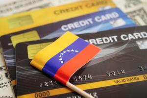 venezuela flagga på kreditera kort, finansiera ekonomi handel handla uppkopplad företag. foto