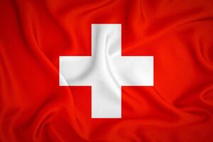 schweiz flagga bakgrund. schweiz flagga med tyg textur foto
