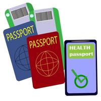 två utländska pass, två passagerarbiljetter och boardingkort för planet och telefon med hälsopass och flygtillstånd. begreppet flygresor med flyg, internationell turism och resor foto