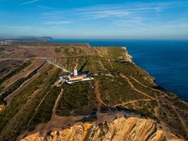 fyr på cabo epichel cape epichel på atlanten hav foto