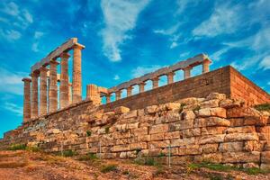 poseidon tempel ruiner på cape sounio på solnedgång, grekland foto