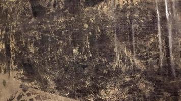 abstrakt bakgrund av smutsig svart polyeten i dammet. kopieringsutrymme foto