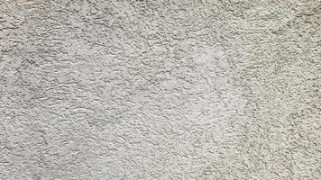 betongvägg textur. vit stuckatur vägg bakgrund. vitmålad cementvägg. vit betongvägg och golv som bakgrundsstruktur. loft i stil med designidéer för ett bostadshus. foto