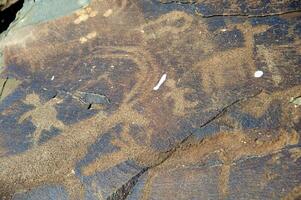 petroglyphs inom de arkeologisk landskap av tamgaly. almaty område, kazakhstan foto