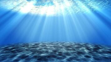 hav under vattnet ljus skön slöja av solljus. hav vågor under vattnet rörelse och strömma med de strålar.stråle lysande från djup klar blå vatten orsakar en skön vatten belysning reflektioner.film foto