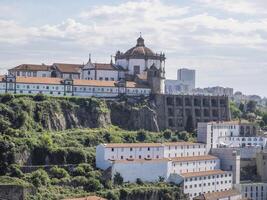 kyrka av helgon augustin igreja do mosteiro de santo agostinho da serra do pilar porto portugal se från bro på de douro flod stadsbild foto