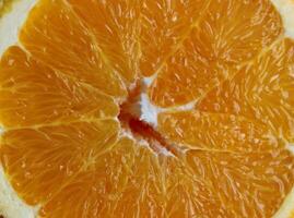 textur av saftig våt massa av en skära orange makro skott fyrkant stock Foto