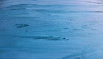 en Metod för applicering stroke av olja måla till duk till skapa textur i annorlunda nyanser av blå foto
