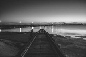 solnedgång på st kilda pir i melbourne, Australien. foto