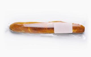 färsk baguette i transparent förpackning foto