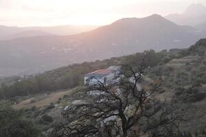 solnedgång Bakom de berg, Spanien foto