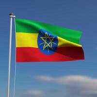 etiopien flagga är vinka i främre av en blå himmel med suddig moln i de bakgrund foto