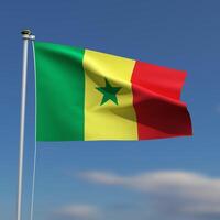 senegal flagga är vinka i främre av en blå himmel med suddig moln i de bakgrund foto